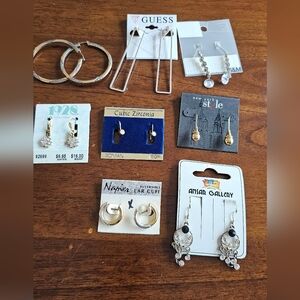 Eight Pairs Of Goldtone and Silvertone Crystal Earrings